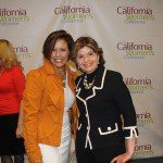 Two women standing next to each other at a california women event.