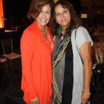 Two women posing for a picture.
