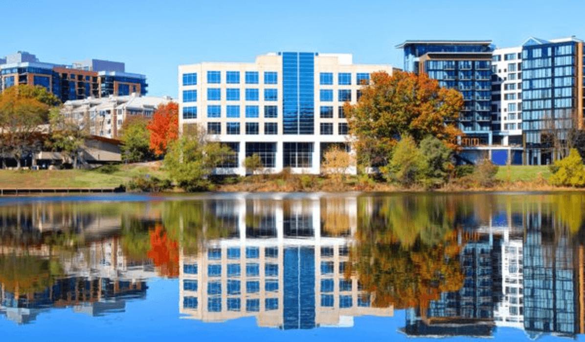 A building with its reflection on the water